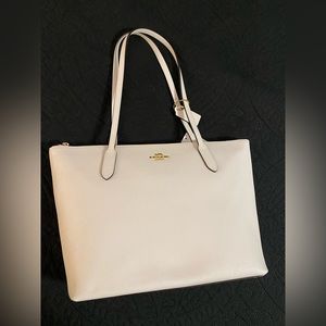 Coach zip tote in chalk.